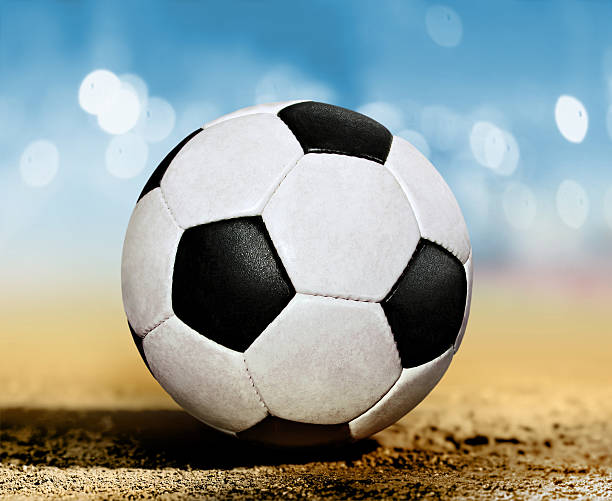 istock soccer ball on ground 164144461