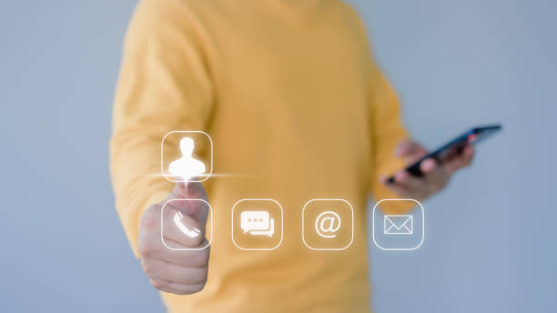 istock User touching on virtual screen contact icons ( phone, chat, email, telephone). Customer service, helpdesk advice online support. Contact us or Customer support hotline. 1641446647