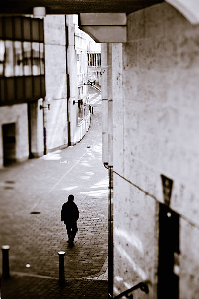 Solitary Man in an Alley
