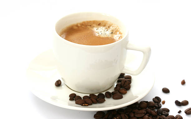 istock Whole coffee beans and cup scattered on white background 164147630