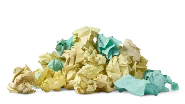 pile of crumpled waste paper isolated on white background, collected junk or discarded products in household, office or school, paper waste recycling concept save trees and reduce environmental impact