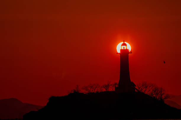 istock a lighthouse at a seaside port 1641486188