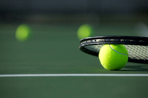 istock Tennis Ball and Racket 164150187