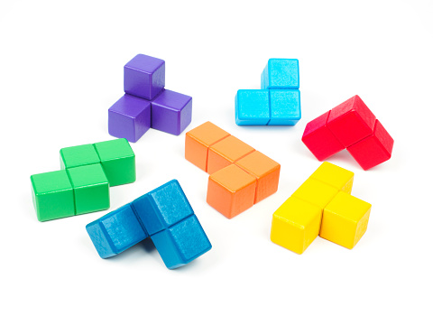 Colorful wood blocks stack game on the table with copy-space, background concept