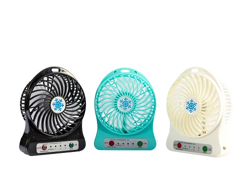 Portable rechargeable small fans on white isolated background