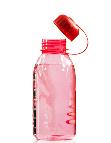 A plastic vibrant pink water/sport bottle with white background. BAP free.