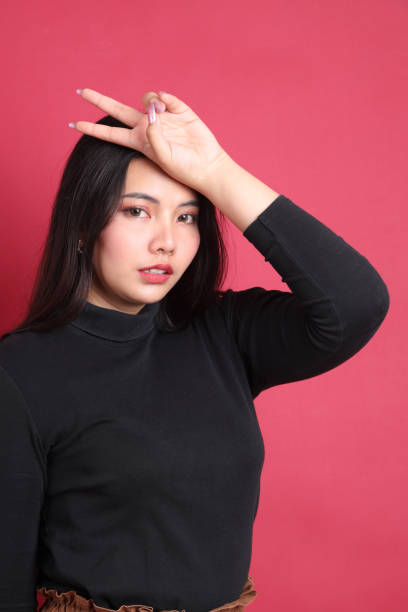 istock Woman in Red 1641638923