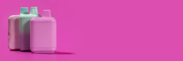 istock Disposable electronic cigarettes, vape, ecigarettes on a pink background 1641658668