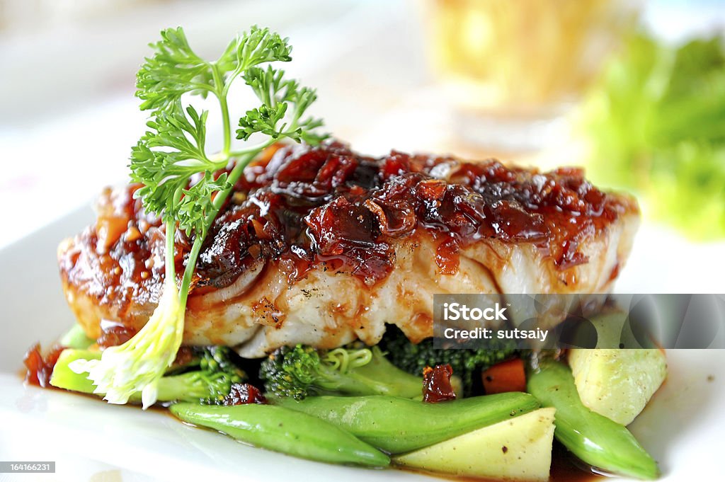 Fish Steak with vegetables Fish steak Food Stock Photo