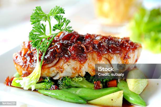 Fish Steak With Vegetables Stock Photo - Download Image Now - Food, Restaurant, Taking a Shot - Sport