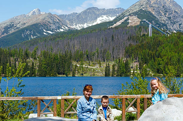 istock Strbske Pleso (Slovakia) spring view and family 164171255
