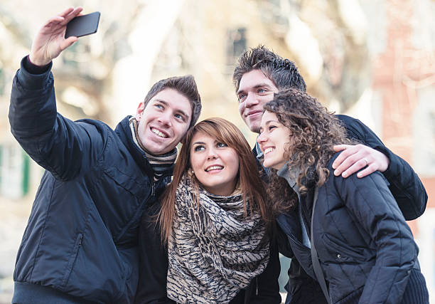 istock Female friends taking a self portrait 164171371
