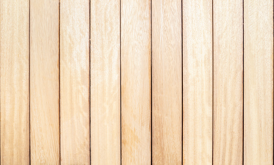 Close-up view of the texture of a wooden table.