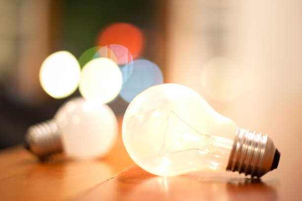 istock Abstract background of creative ideas concept from lightbulb and bokeh, Object design with grain texture 1641733095