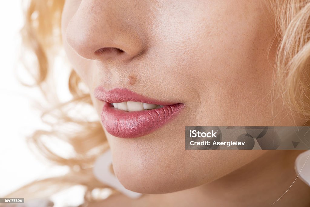 face with a mole part of a woman's face with a mole close-up Mole - Skin Stock Photo