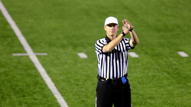 Referee calls a play