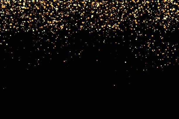 Vector illustration of Gold glitter texture on black background. Golden dots background. Festive background element.