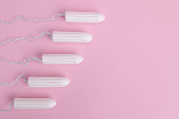 istock Hygienic female tampon on a pink background 1641769728