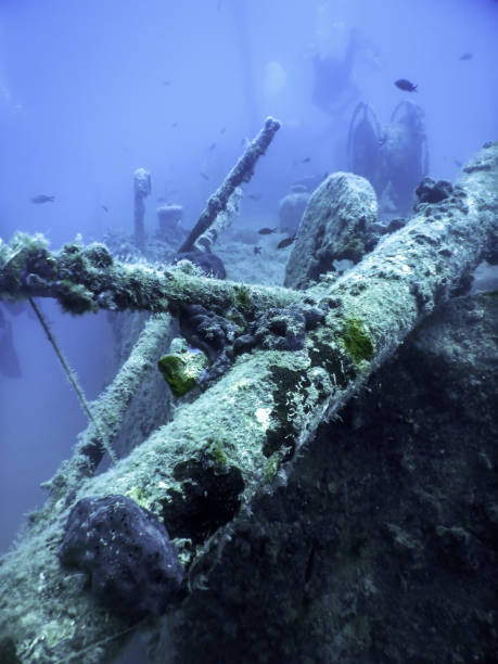 istock Shipwreck in the Blue Water, Rusty Shipwreck with Growing Corals 1641785545
