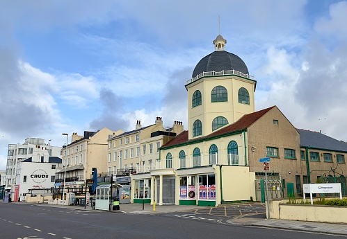Worthing, UK - August 12, 2023: The historic Dome Cinema dating from 1911 on the seafront in Worthing, West Sussex, England.