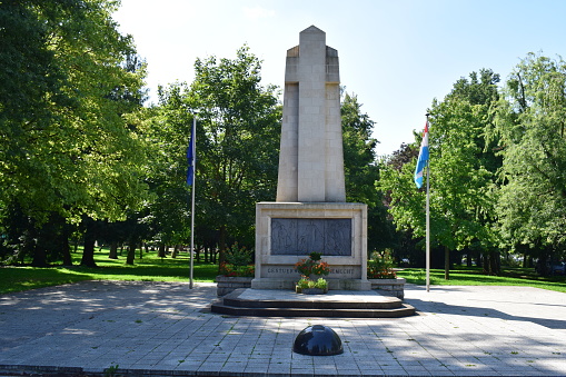 Bettembourg, Luxembourg - 08/22/2023: war memorial in a park