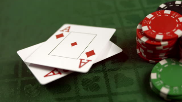 HD SLOW MOTION: Pair Of Aces Falling On A Table