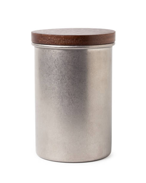 Metal tin can box with lid is made of wood isolated on white background. With clipping path. stock photo