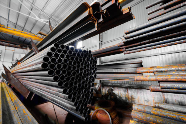 istock Cold rolled pipes stacked on shelving unit in plant storage 1641874570