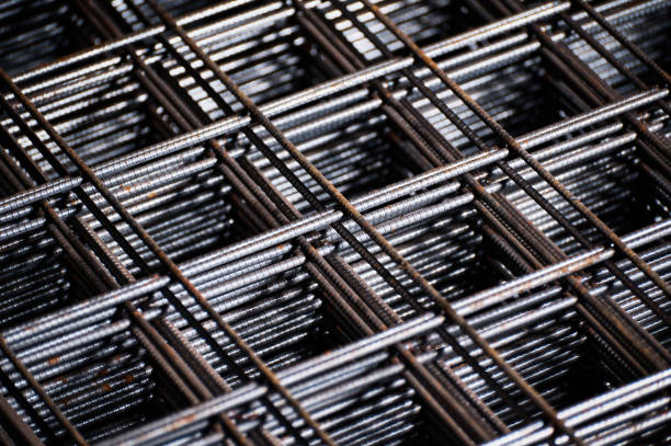 istock Stacked welded wire mesh in cold plant storehouse macro view 1641874597
