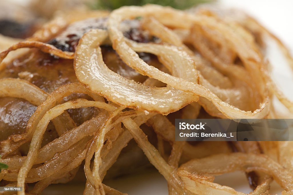 Roasted Meat whith onion Roasted Meat whith onion, white background Close-up Stock Photo