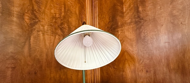 Reading Lamp on wooden background