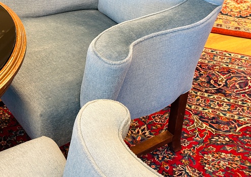 Two grey armchairs