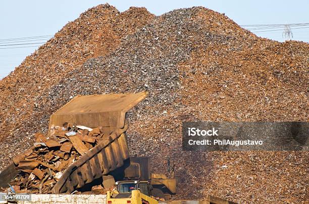 Truck Dumping Scrap Metal Into Container Stock Photo - Download Image Now - Scrap Metal, Shredded, Black Color