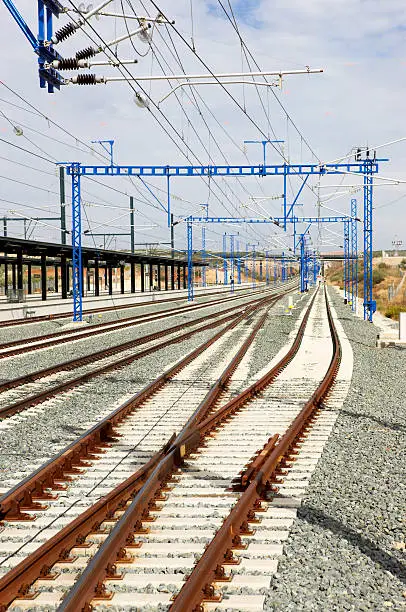 Railway with electric posts and platforms vertical