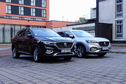 Braunschweig, Germany - 18th September, 2022: MG EHS plug-in hybrid vehicles parked on a public parking. MG Motor UK Limited (MG Motor) is a British automotive company owned by SAIC Motor UK.