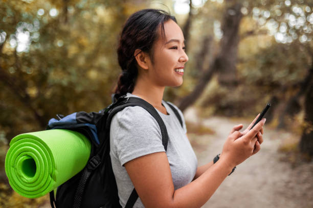 istock Asian Woman Empowered by Her Smartphone 1641969118