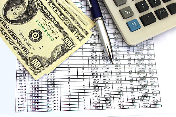 istock table with numerals and american dollars 164202869