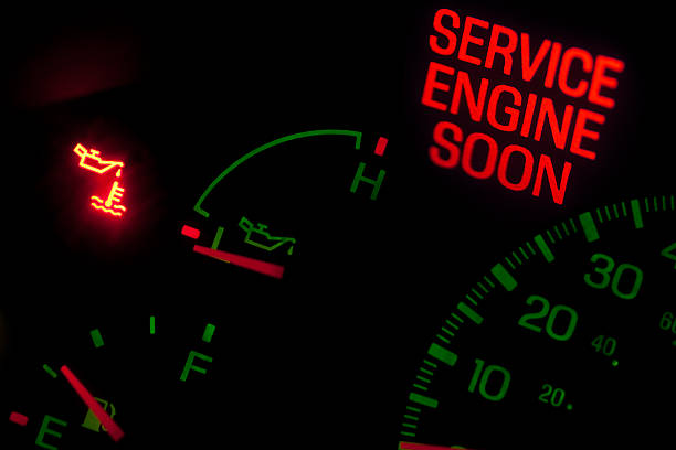 Check engine light Service engine soon light on dashboard light commercial vehicle stock pictures, royalty-free photos & images