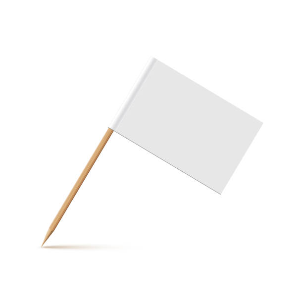 istock White flag on wooden toothpick. Rectangle paper topper for cake or other food isolated on white background. Blank mockup for advertising and promotions, location mark, map pointer 1642085920