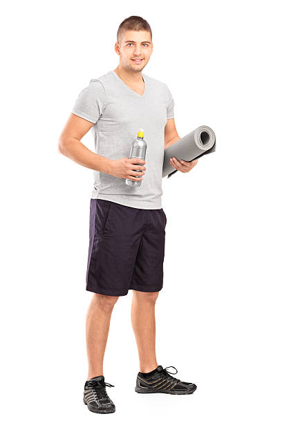 istock Male holding a bottle and mat 164209635
