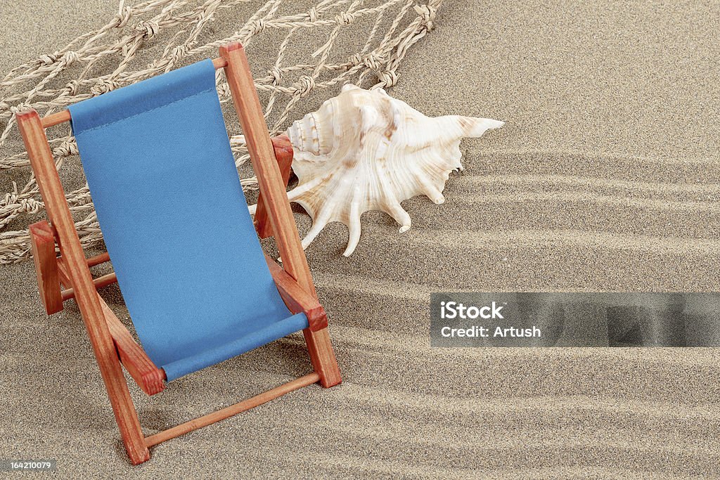 Concha do mar e sol na areia lounger - Royalty-free Areia Foto de stock