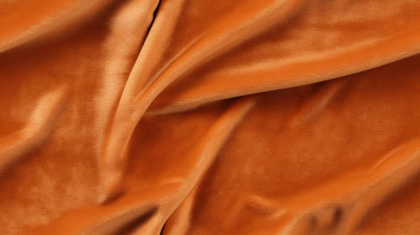 istock Velvet light orange textile cloth texture 1642122870