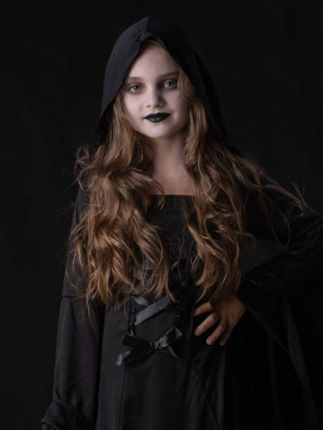 istock Girl in Halloween Witch Costume 1642132106