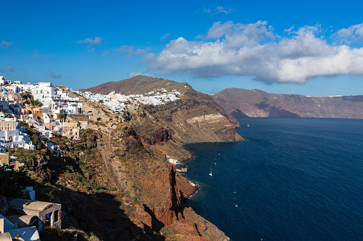 Oia is a charming village in Santorini, Greece. It has white buildings, blue-domed churches, and famous sunset views. The village offers boutique shops, art galleries, and a cultural scene, making it a popular destination for travelers seeking beauty and relaxation.