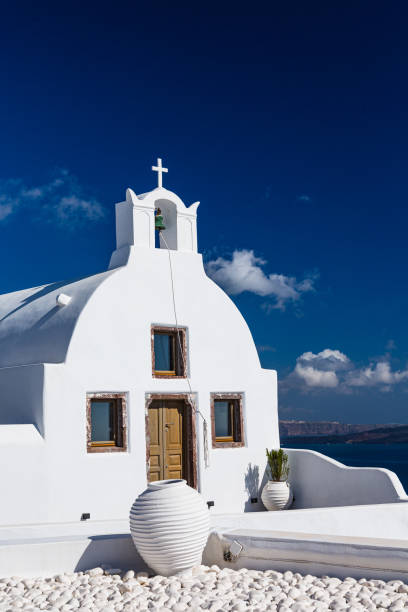 istock White Church in Oia, Santorini, Greece 1642140610