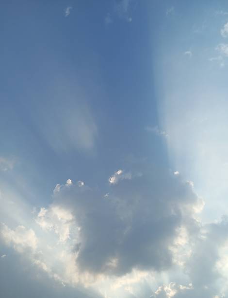 istock the view of the cloudy blue sky illuminated by the sunlight from behind 1642156014