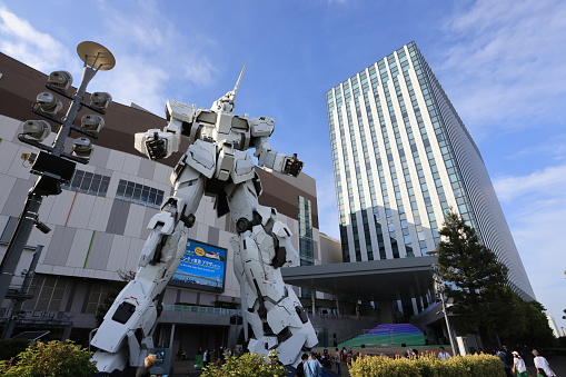 Tokyo May 5 2023: RX-0 Unicorn Gundam statue display outside Odaiba's DiverCity Tokyo Plaza in Odaiba seaside park