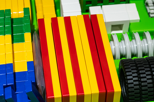 Tambov, Russian Federation - July 24, 2016: Four Lego baseplate - yellow, green, blue and gray. Studio shot.