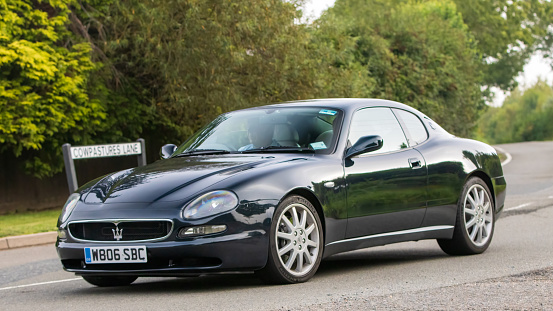 Whittlebury,Northants,UK -Aug 26th 2023: 2000 Maserati 3200 GT car travelling on an English country road