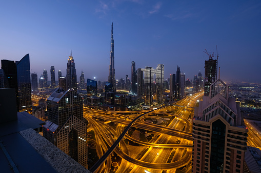 UAE Dubai cityscape skyline city blue hour night aerial view